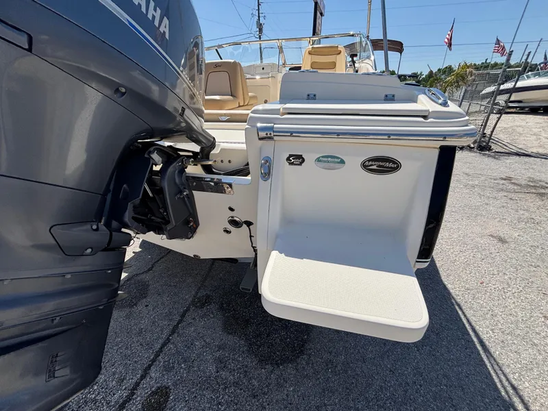 Slide: The Image of 2018 Scout 210 Dorado boat with Yamaha engine, rear view showing swim platform. - 18