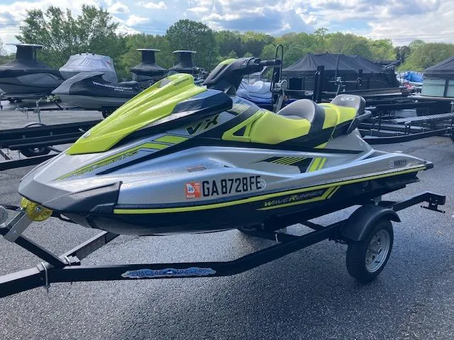 The Image of 2020 Yamaha WaveRunner VX Cruiser HO on trailer, lime green and gray design. - 0