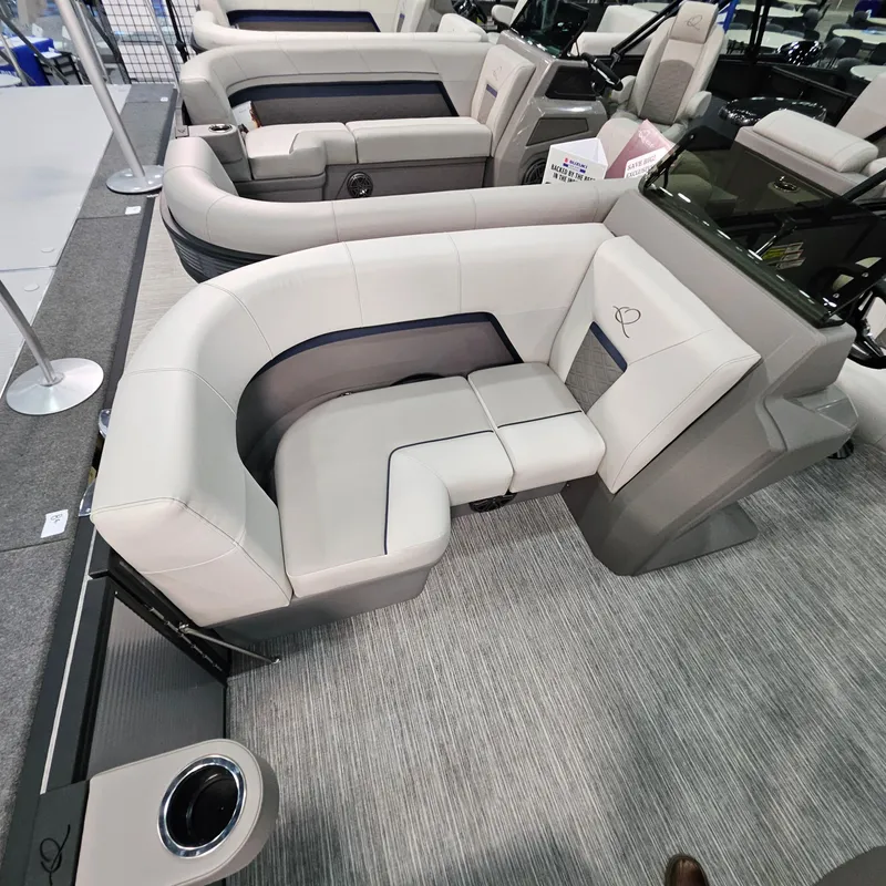 Slide: The Image of Luxurious seating in 2025 Qwest E 20RLS boat, featuring modern design and comfort. - 15