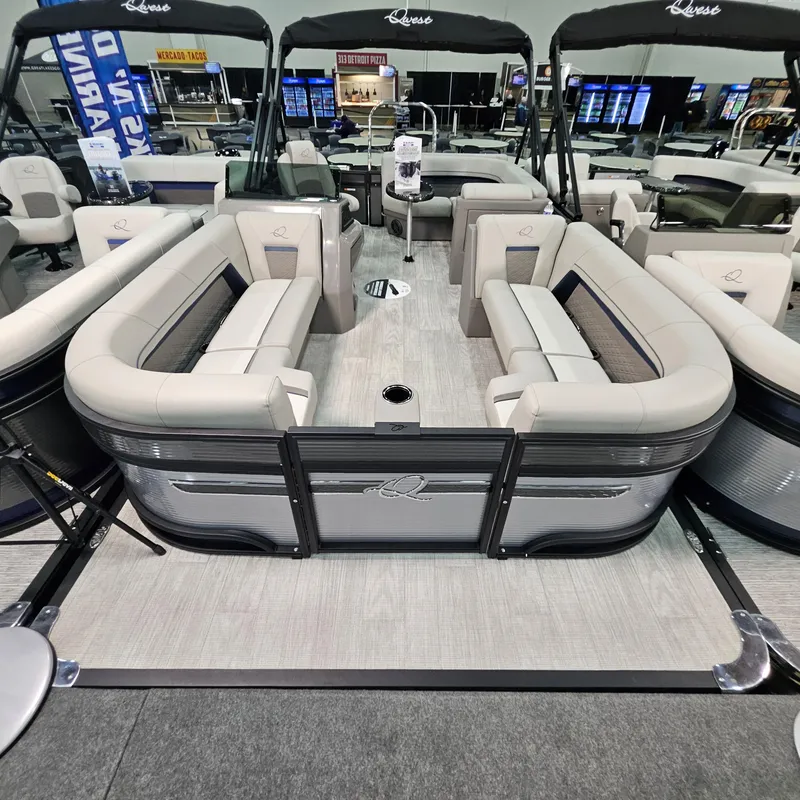 Slide: The Image of 2025 Qwest L22 Lanai pontoon boat with spacious seating and modern design. - 4