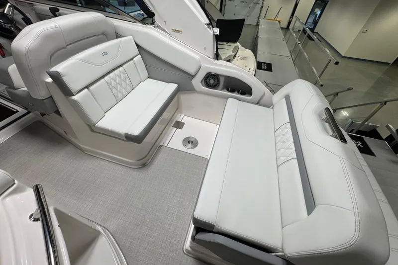 Slide: The Image of 2025 Regal 28 Express boat interior with luxurious white seating and modern design. - 3
