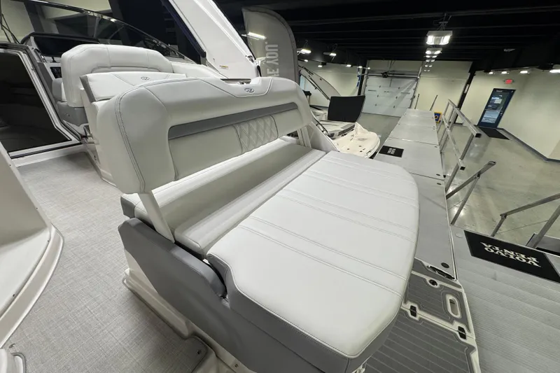 Slide: The Image of 2025 Regal 28 Express boat interior with luxurious seating and modern design. - 4