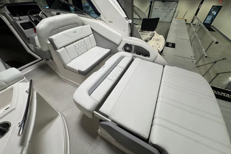 Slide: The Image of Luxurious interior of 2025 Regal 28 Express boat with plush seating and modern design. - 5