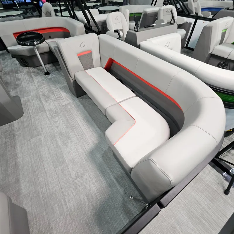 Slide: The Image of Luxurious seating in 2025 Qwest E 20XRE boat, featuring modern design and comfort. - 18