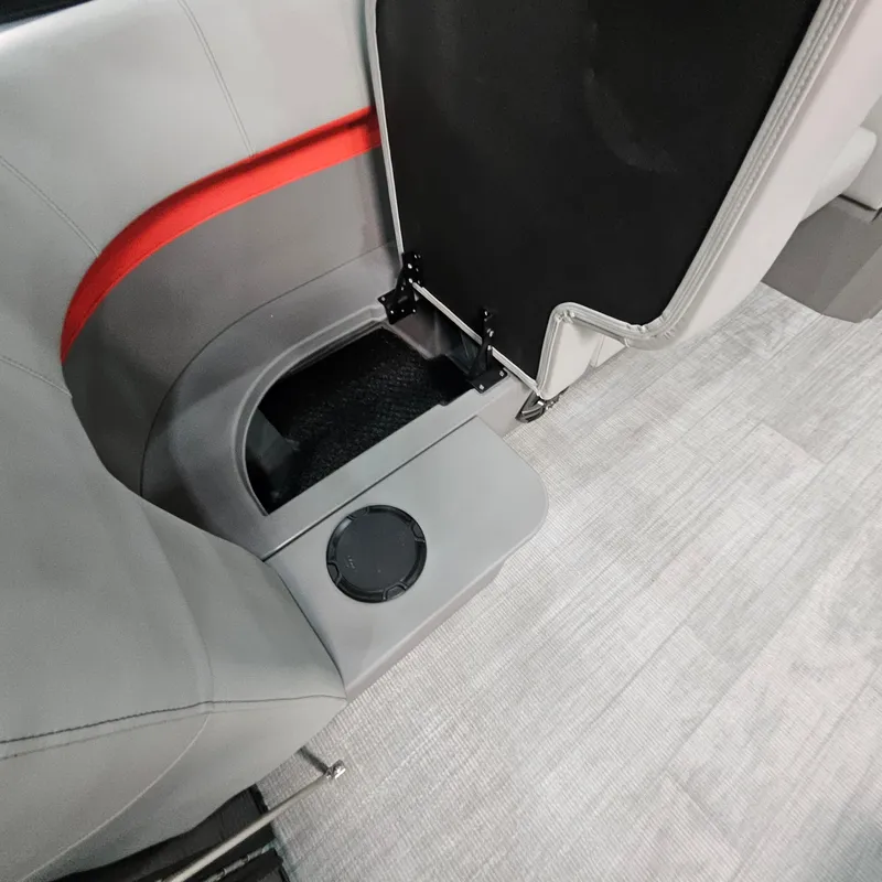 Slide: The Image of Interior of 2025 Qwest E 20XRE with cup holder and storage compartment. - 20