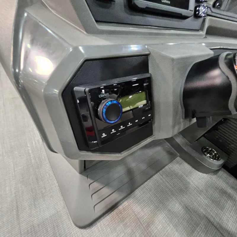 Slide: The Image of Dashboard of 2025 Qwest E 20XRE with modern control panel and display. - 31