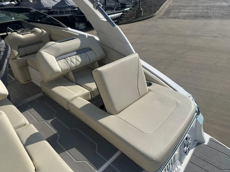 Slide: The Image of 2022 Regal LS4 Surf boat with beige seating and adjustable backrest. - 33