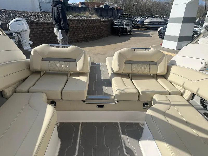 Slide: The Image of 2022 Regal LS4 Surf boat interior with beige seating and modern design. - 34