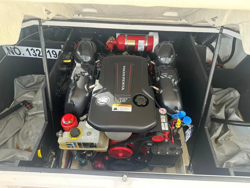 Slide: The Image of Engine compartment of 2022 Regal LS4 Surf boat with Volvo Penta engine. - 37