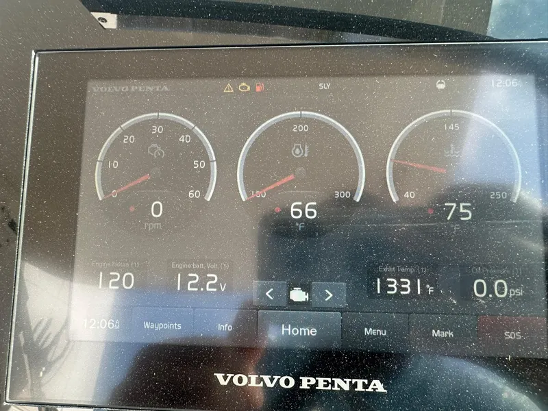 Slide: The Image of Volvo Penta dashboard display on 2022 Regal LS4 Surf boat, showing engine metrics. - 41