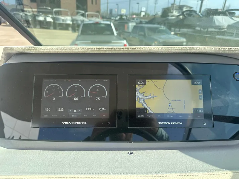 Slide: The Image of Dashboard of a 2022 Regal LS4 Surf boat with Volvo Penta displays. - 43