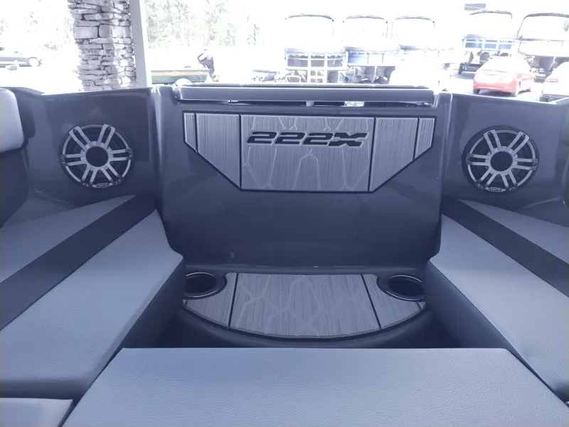 Slide: The Image of 2025 Yamaha Boats 222XD interior with speakers and seating. - 6