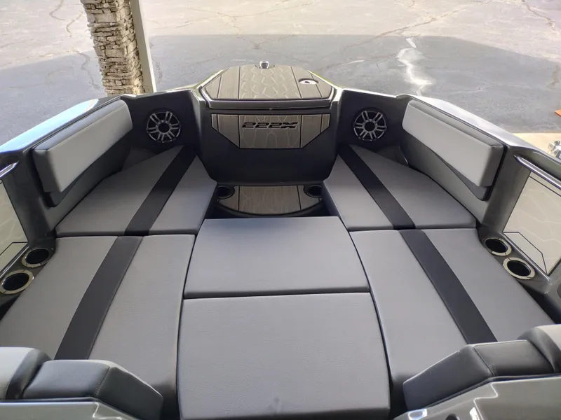 Slide: The Image of 2025 Yamaha Boats 222XD interior, featuring spacious seating and modern design elements. - 7