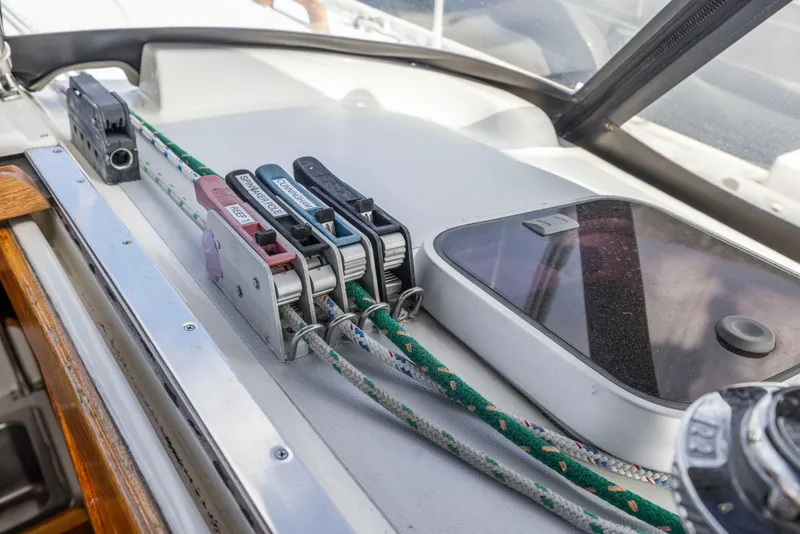 Slide: The Image of Close-up of 1986 J Boats J/40 sailboat deck with rope clutches and hatch. - 39