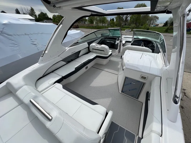 Slide: The Image of Luxurious interior of 2025 Regal 3300 boat with sleek white seating. - 11