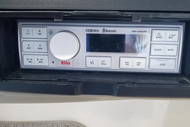 Slide: The Image of Boat stereo system in a 2000 Rinker 212 Captiva with Bluetooth and USB features. - 10