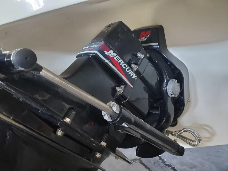 Slide: The Image of Mercury outboard motor on 2000 Rinker 212 Captiva boat. - 4