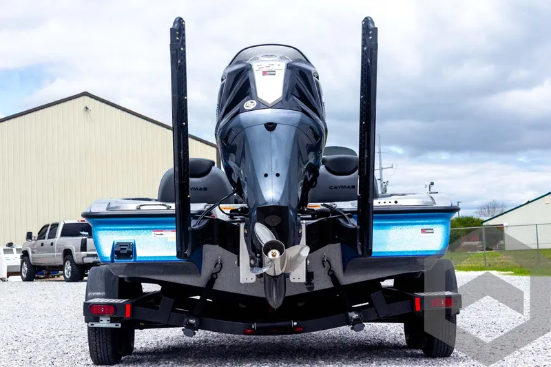 Slide: The Image of 2025 Caymas CX 20 PRO boat rear view, showcasing powerful engine and sleek design. - 15