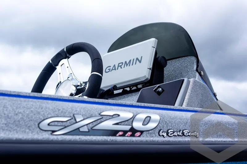 Slide: The Image of 2025 Caymas CX 20 PRO boat dashboard with Garmin navigation system. - 21