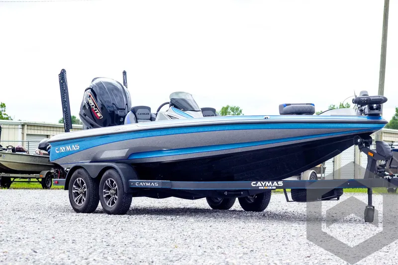 Slide: The Image of 2025 Caymas CX 20 PRO boat with sleek design on a trailer. - 3