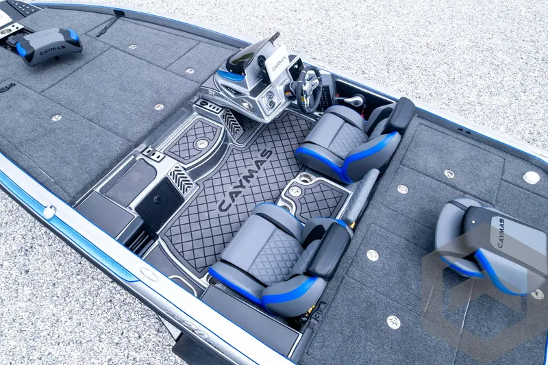 Slide: The Image of 2025 Caymas CX 20 PRO boat interior with sleek seating and modern dashboard design. - 38