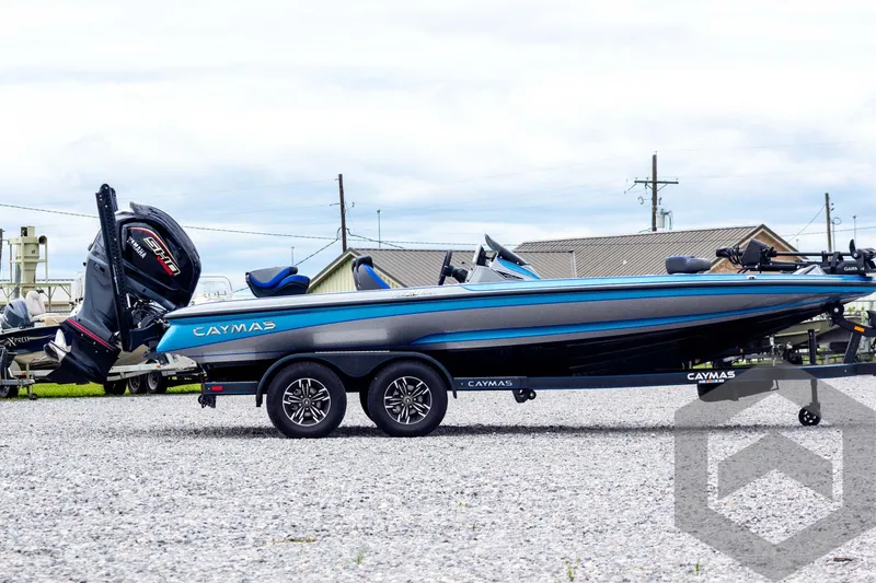 Slide: The Image of 2025 Caymas CX 20 PRO boat on trailer, side view, outdoors. - 4