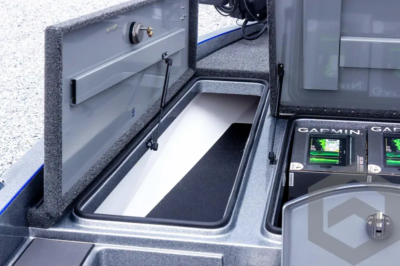 Slide: The Image of 2025 Caymas CX 20 PRO boat storage compartments with advanced electronics. - 40
