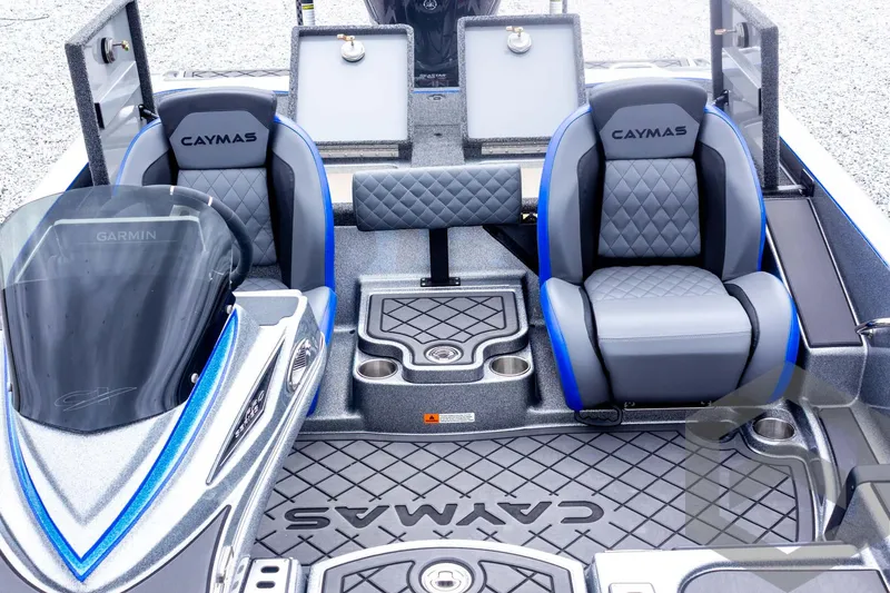 Slide: The Image of 2025 Caymas CX 20 PRO boat interior with dual seats and advanced dashboard. - 48
