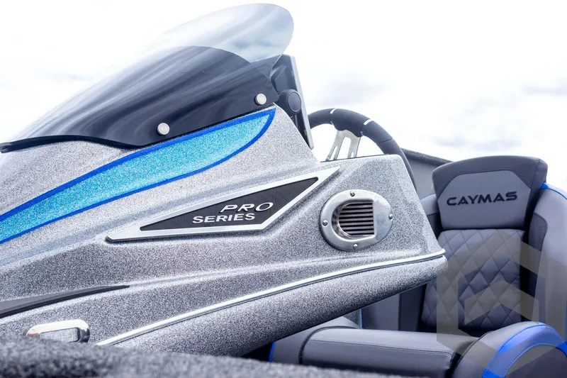 Slide: The Image of 2025 Caymas CX 20 PRO boat interior with sleek design and comfortable seating. - 49
