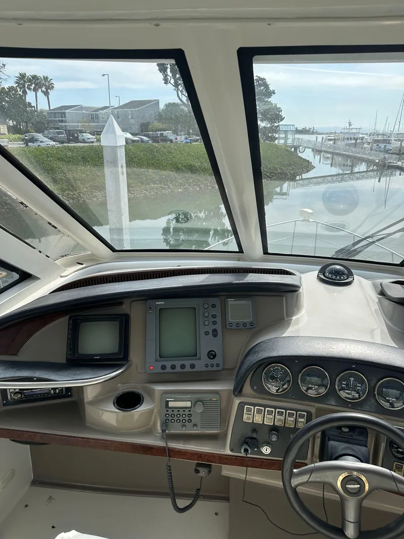 Slide: The Image of Interior view of 2000 Carver 506 Motor Yacht cockpit with navigation instruments. - 15