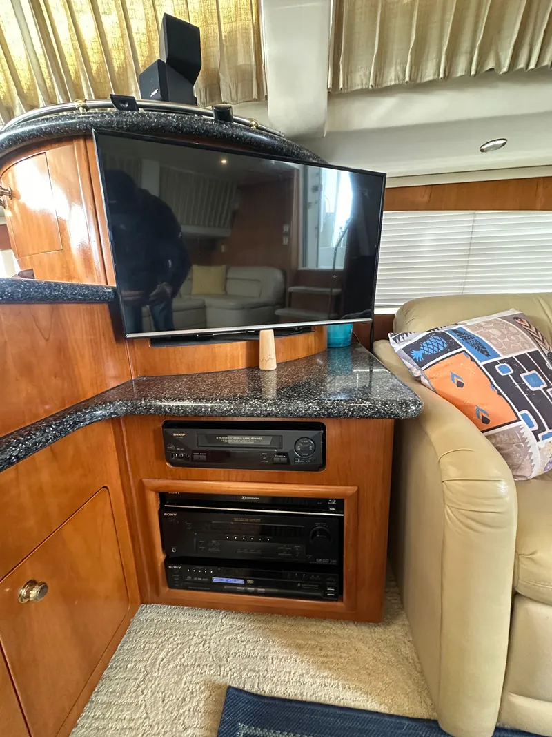 Slide: The Image of Interior of 2000 Carver 506 Motor Yacht with TV and entertainment system. - 20