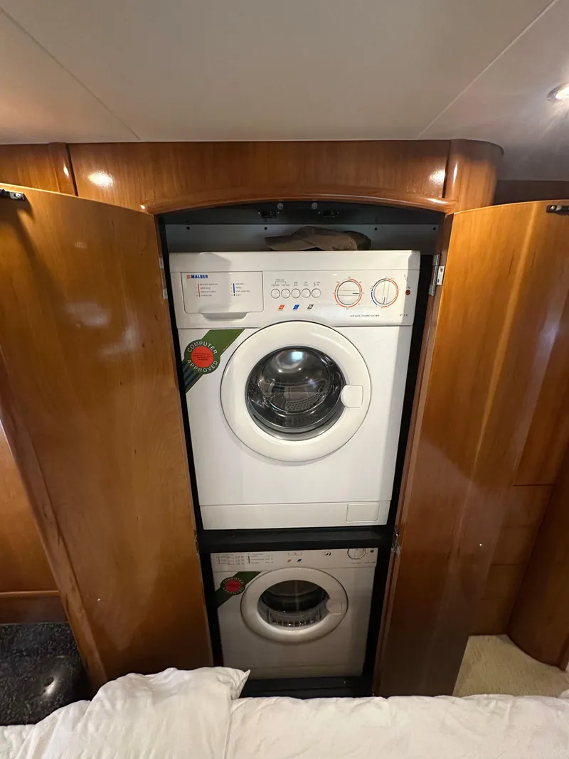 Slide: The Image of Stacked washer and dryer in 2000 Carver 506 Motor Yacht. - 32