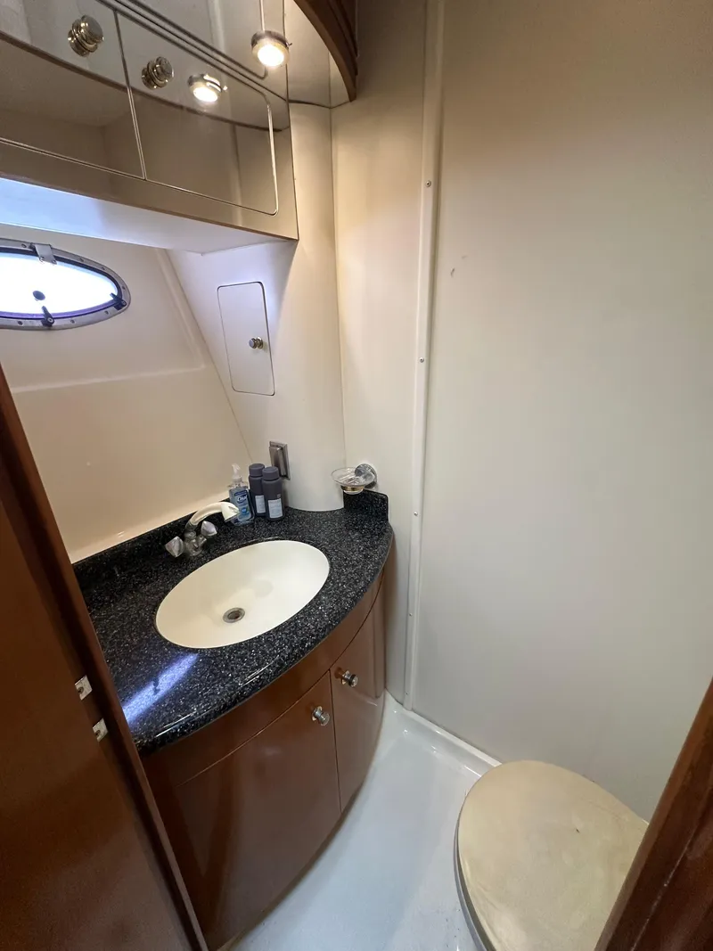 Slide: The Image of Bathroom interior of 2000 Carver 506 Motor Yacht with modern fixtures. - 39