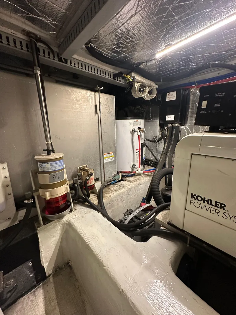 Slide: The Image of Engine room of 2000 Carver 506 Motor Yacht with Kohler power system. - 45