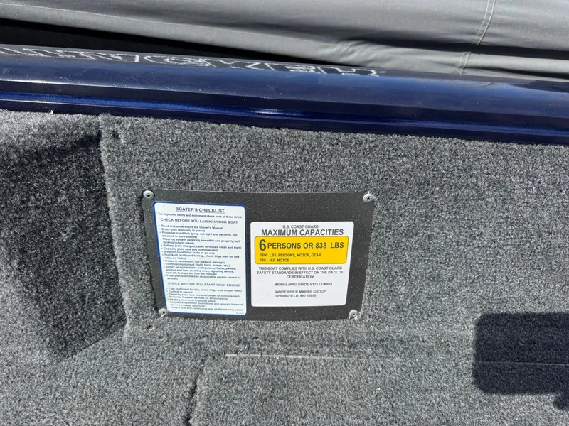 Slide: The Image of 2025 Tracker Pro Guide V-175 Combo capacity label, maximum 6 persons or 838 lbs. - 12