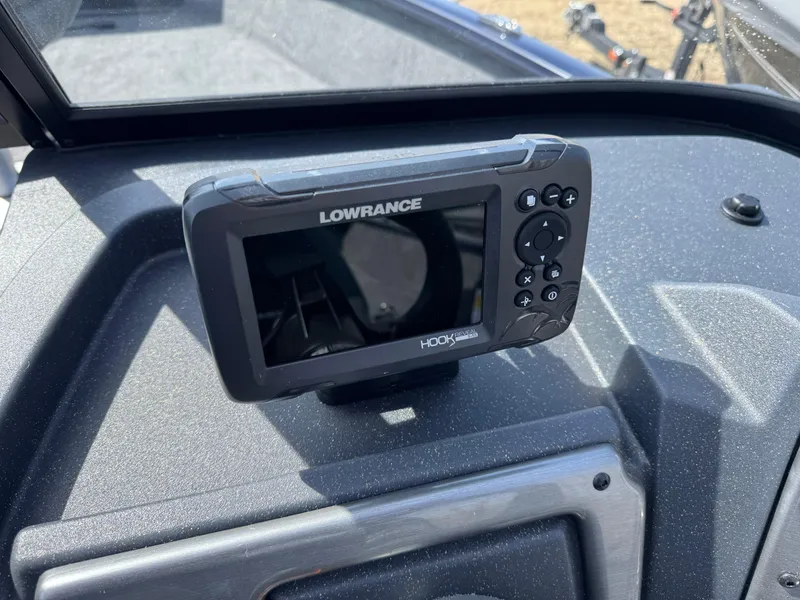 Slide: The Image of Lowrance fish finder on 2025 Tracker Pro Guide V-175 Combo boat dashboard. - 16