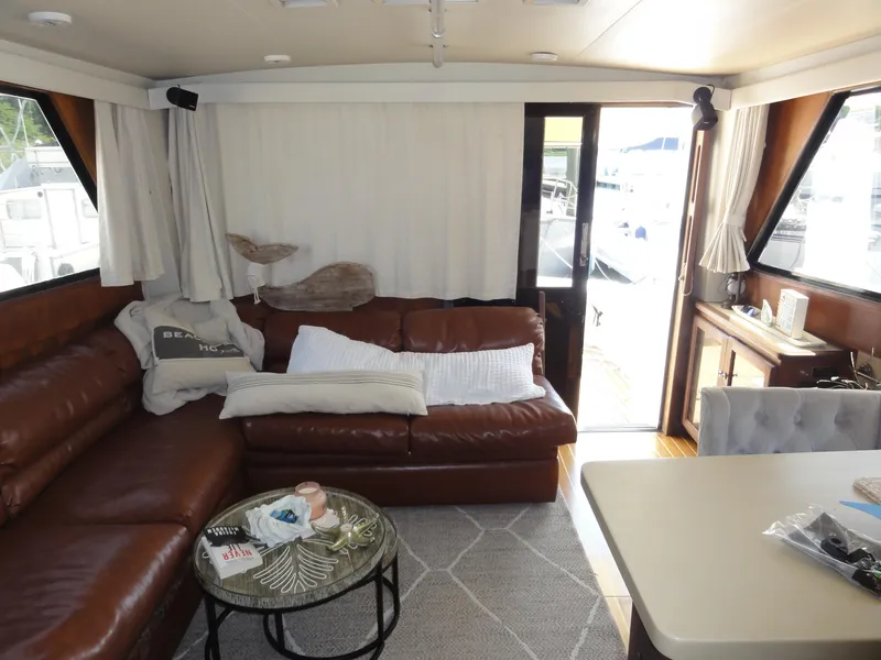 Slide: The Image of Interior of 1990 Viking 45 Convertible yacht with leather seating and modern decor. - 15