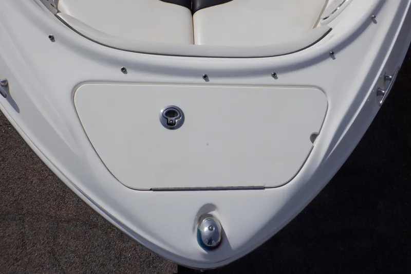 Slide: The Image of Bow of 2012 Sea Ray 205 Sport boat with storage compartment. - 13