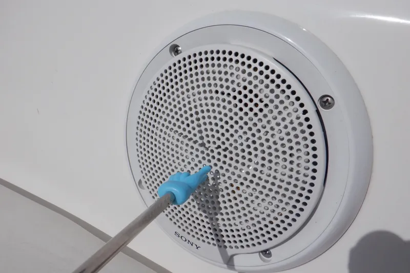 Slide: The Image of White Sony speaker on 2012 Sea Ray 205 Sport boat, close-up view. - 33