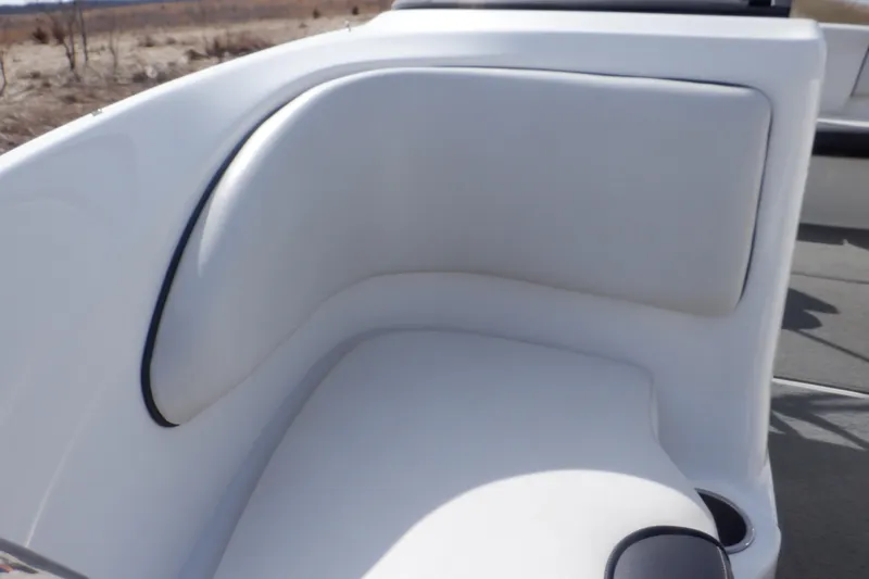 Slide: The Image of White leather seating on a 2012 Sea Ray 205 Sport boat. - 35