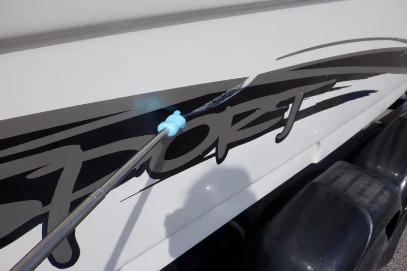 Slide: The Image of 2012 Sea Ray 205 Sport boat with sleek graphics and detailing. - 47