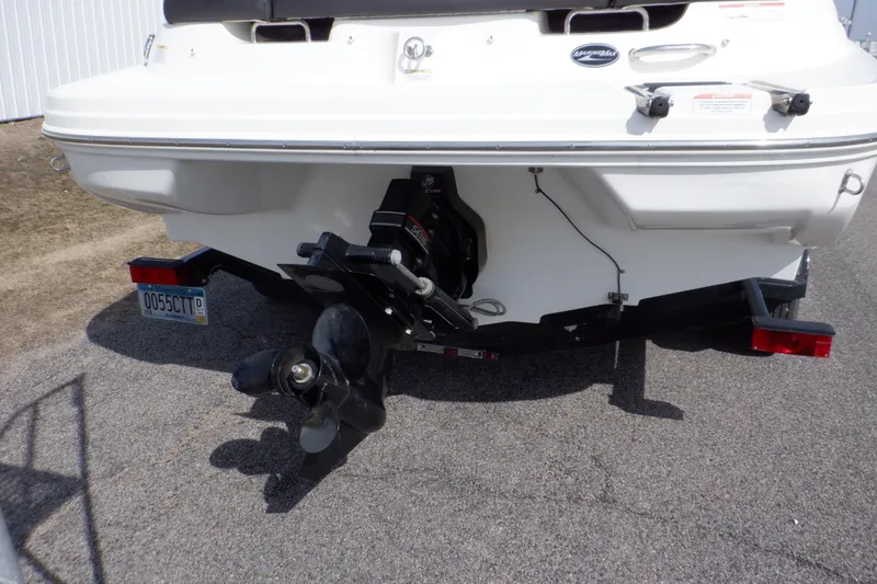 Slide: The Image of Rear view of 2012 Sea Ray 205 Sport boat on trailer, showing propeller and outdrive. - 7