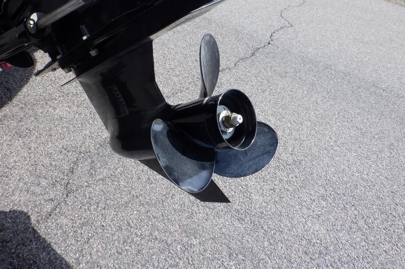 Slide: The Image of Propeller of 2012 Sea Ray 205 Sport boat on pavement background. - 8