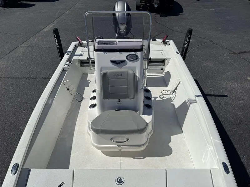 Slide: The Image of 2022 Avid 19 FS boat interior with seating and console, viewed from above. - 28