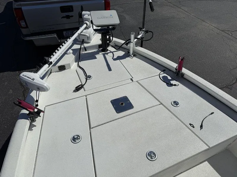 Slide: The Image of Avid 19 FS 2022 boat deck with Garmin equipment and fishing rod holders. - 5