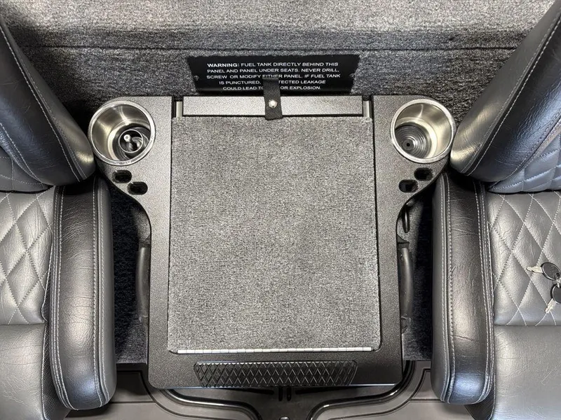 Slide: The Image of Interior of 2025 Phoenix 721 ZXL with leather seats and cup holders. - 15