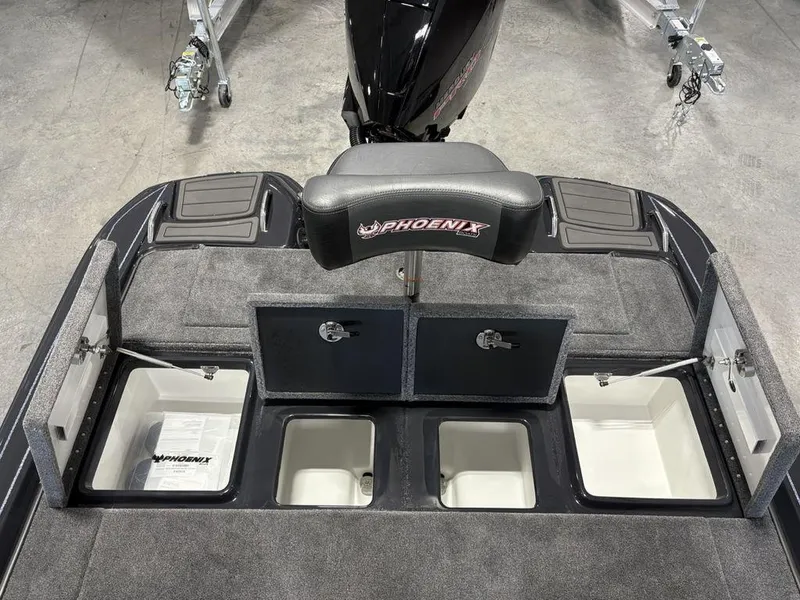 Slide: The Image of 2025 Phoenix 721 ZXL boat interior with storage compartments and seating. - 19