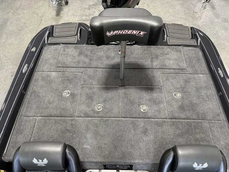 Slide: The Image of 2025 Phoenix 721 ZXL boat deck with gray carpet and branded seat. - 20