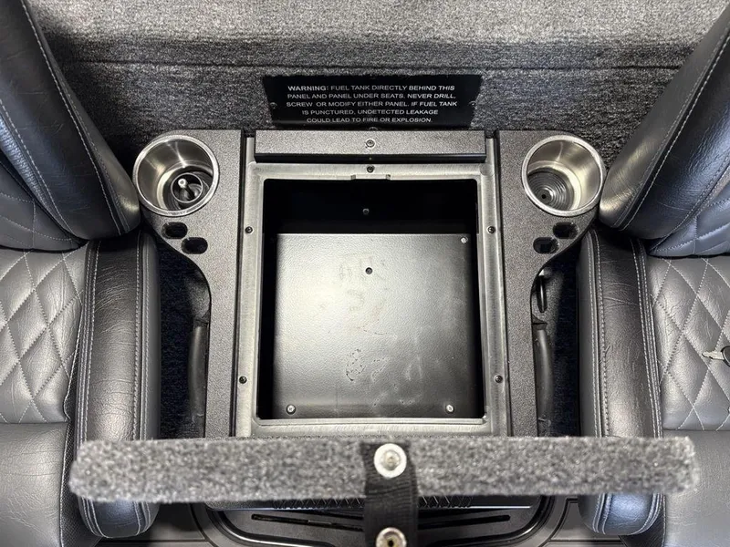 Slide: The Image of Interior of 2025 Phoenix 721 ZXL with cup holders and storage compartment. - 23