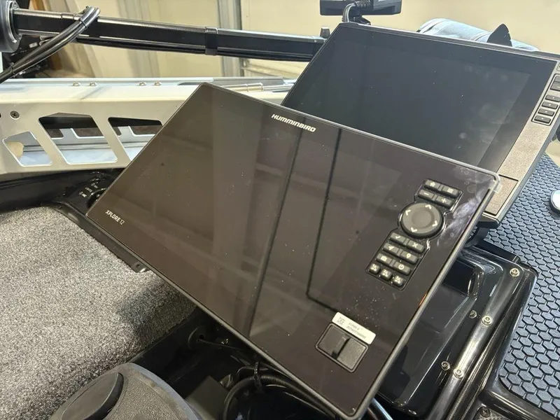 Slide: The Image of 2025 Phoenix 721 ZXL boat dashboard with Humminbird Xplore 12 display. - 5